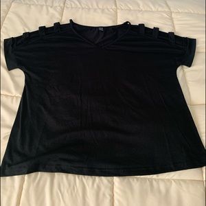 Brand new black top with cut outs on the shoulders. Size large